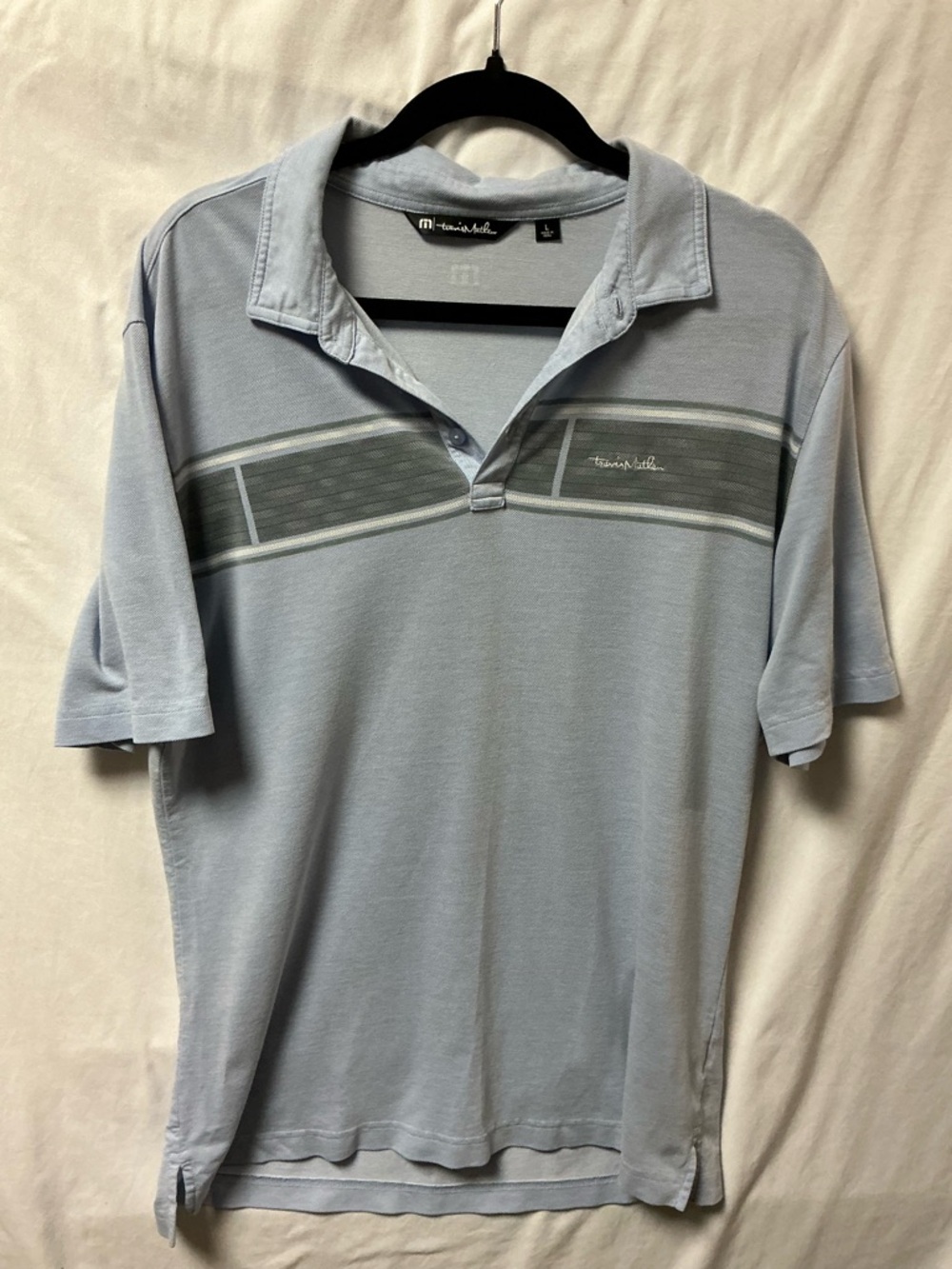 Travis Mathew Nemats Light Blue Polo with Gray Chest Stripe